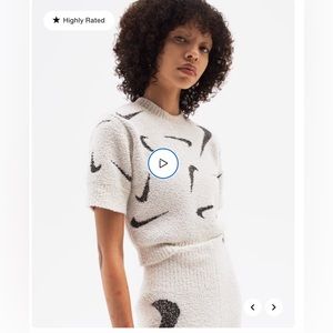 Nike Sportswear Phoenix Cozy Bouclé
Women's Slim Short-Sleeve Cropped Knit Top